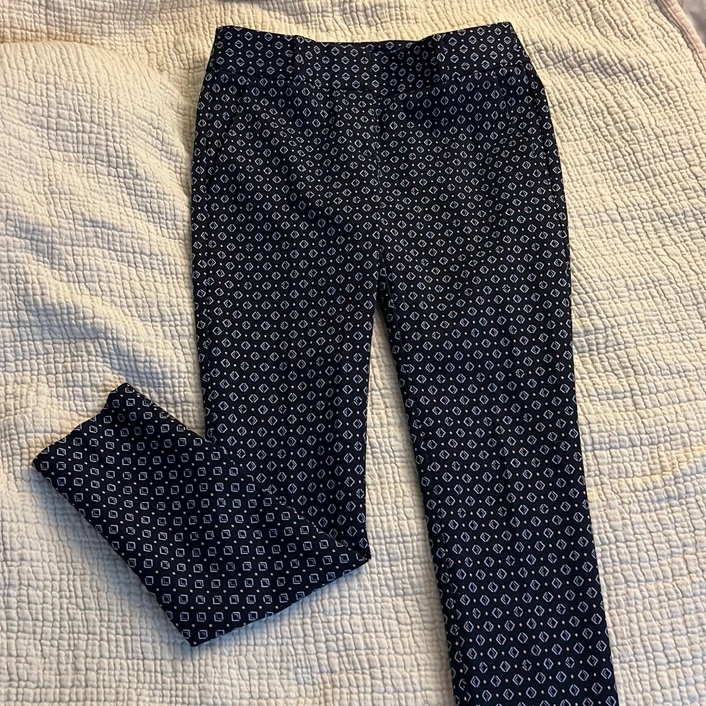 New. Worn once for an interview. Bought too small.